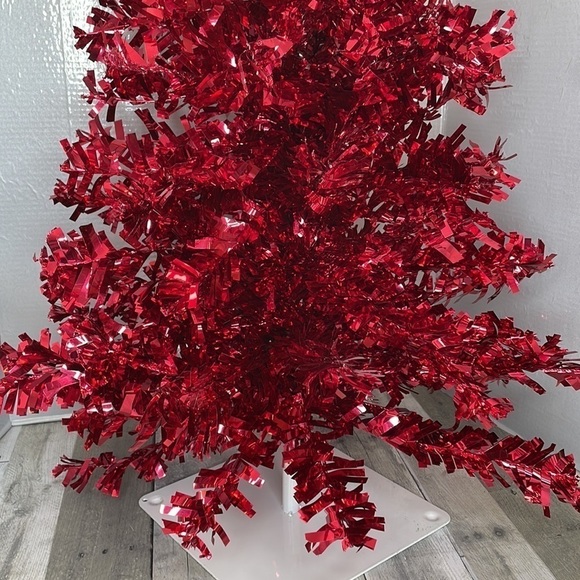 Red tinsel Christmas tree on a white metal base.  Approx 4’ tall. Light weight. - Picture 4 of 8